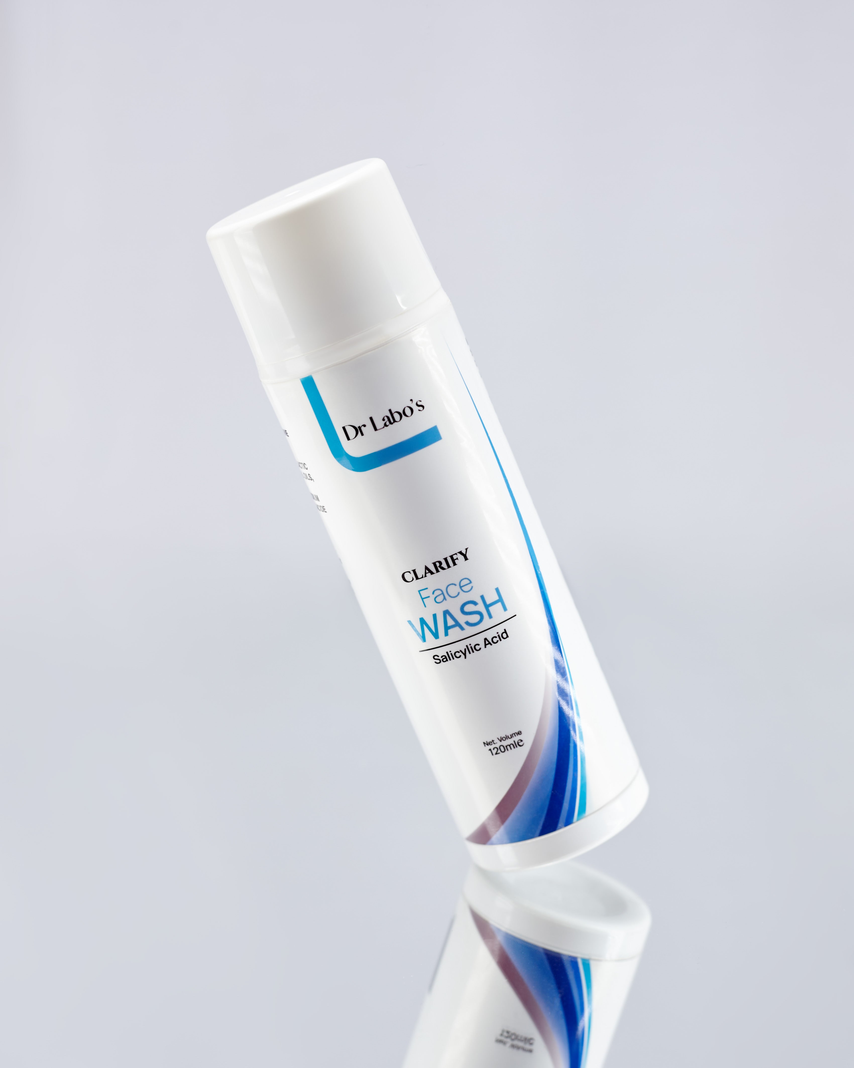 A big slate bottle of Clarify Face Wash