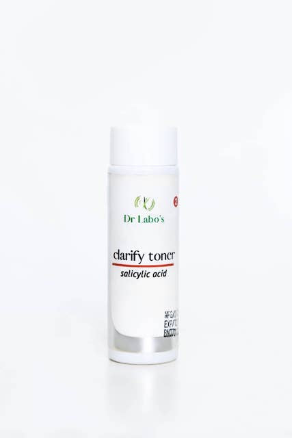 Small white bottle of Clarify Toner